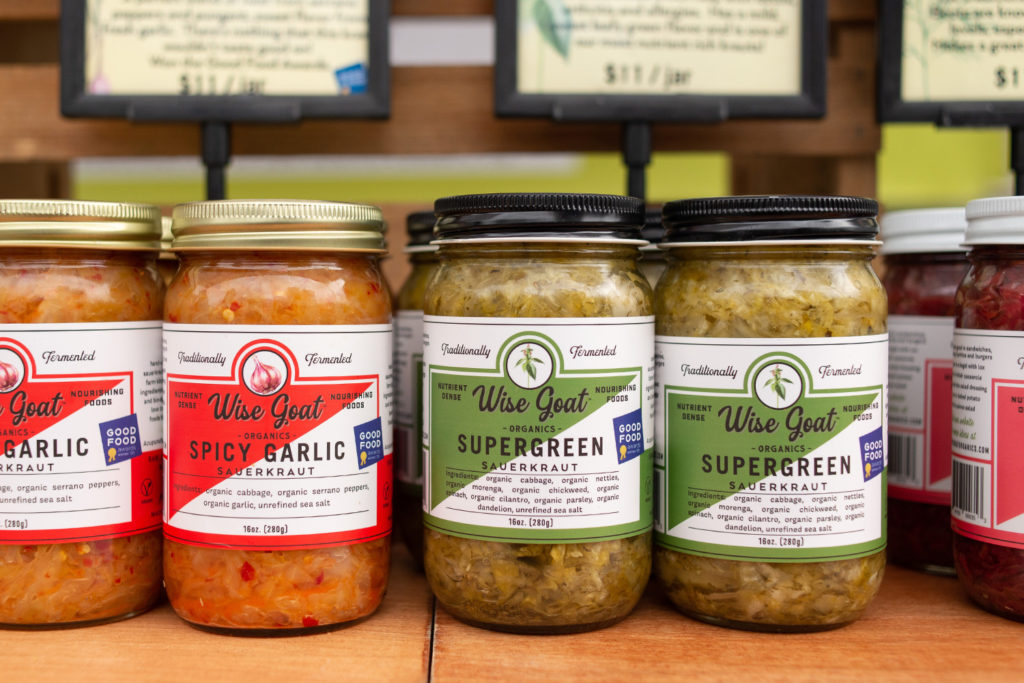 Wise Goal Organics sauerkraut jars at Ferry Plaza Farmers Market stand
